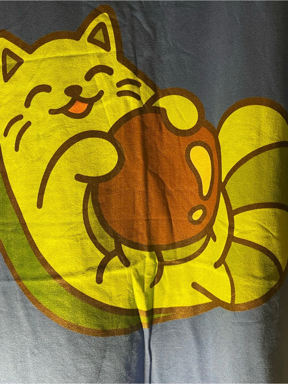 Threadless Blue Tee with Lime Green Cat and Brown Ball